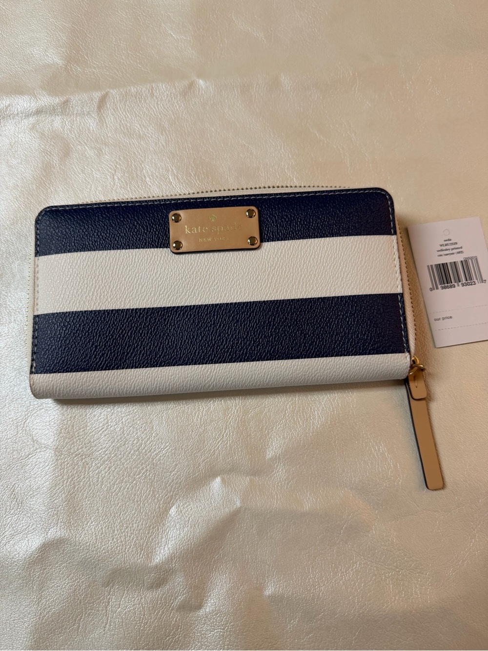 kate spade navy and white striped zip-around wallet
